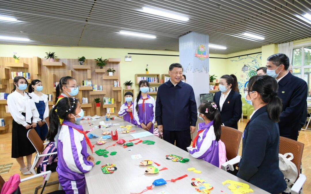 Xi Jinping at the after-school club in Xining in June.